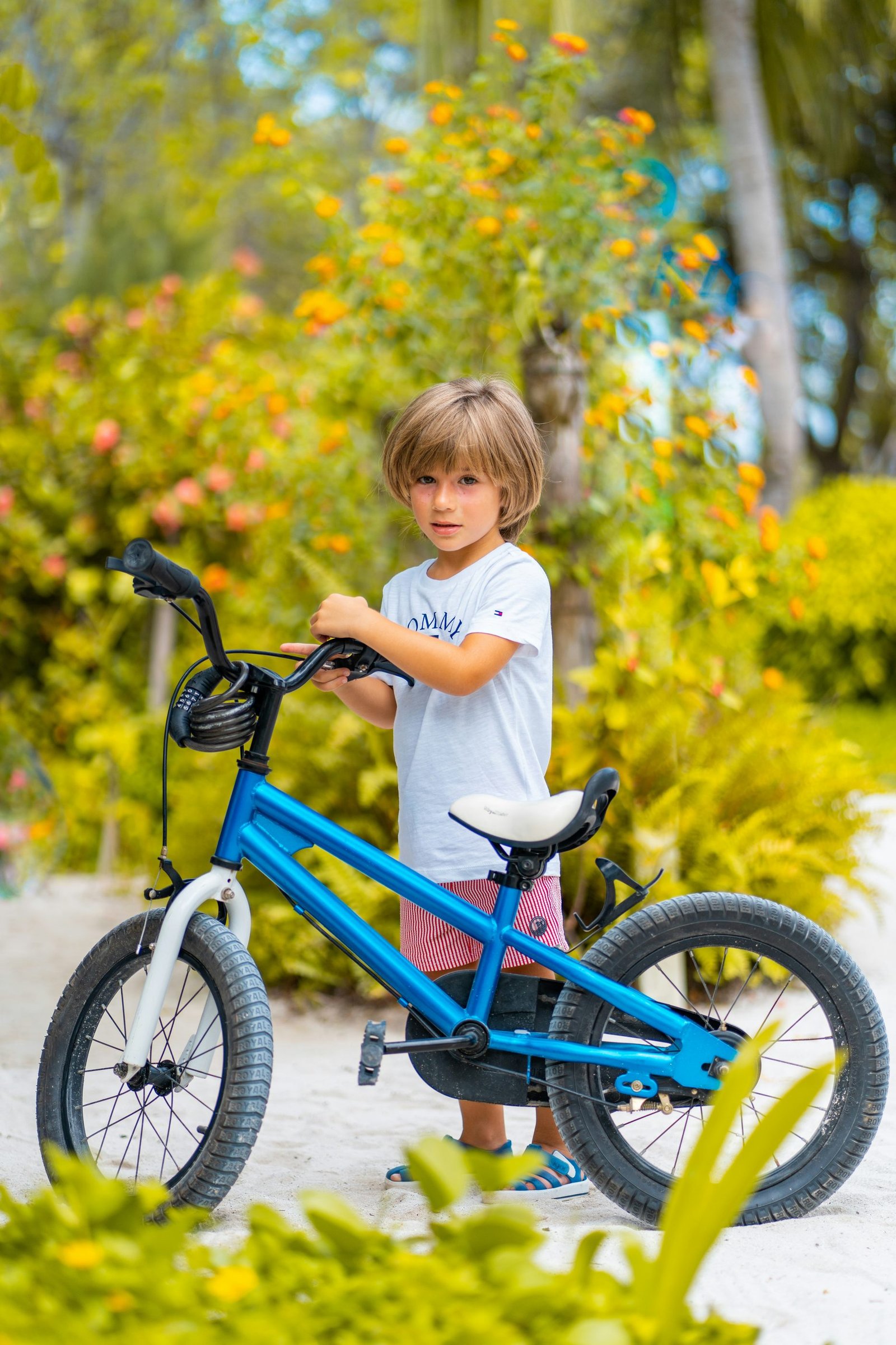Child riding a bike outdoors