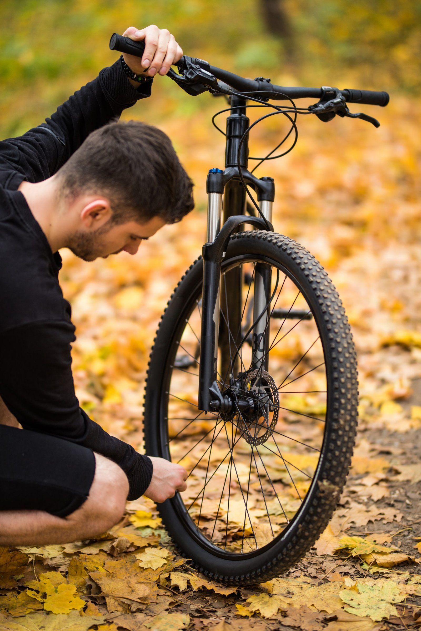 Rider fixing a bicycle