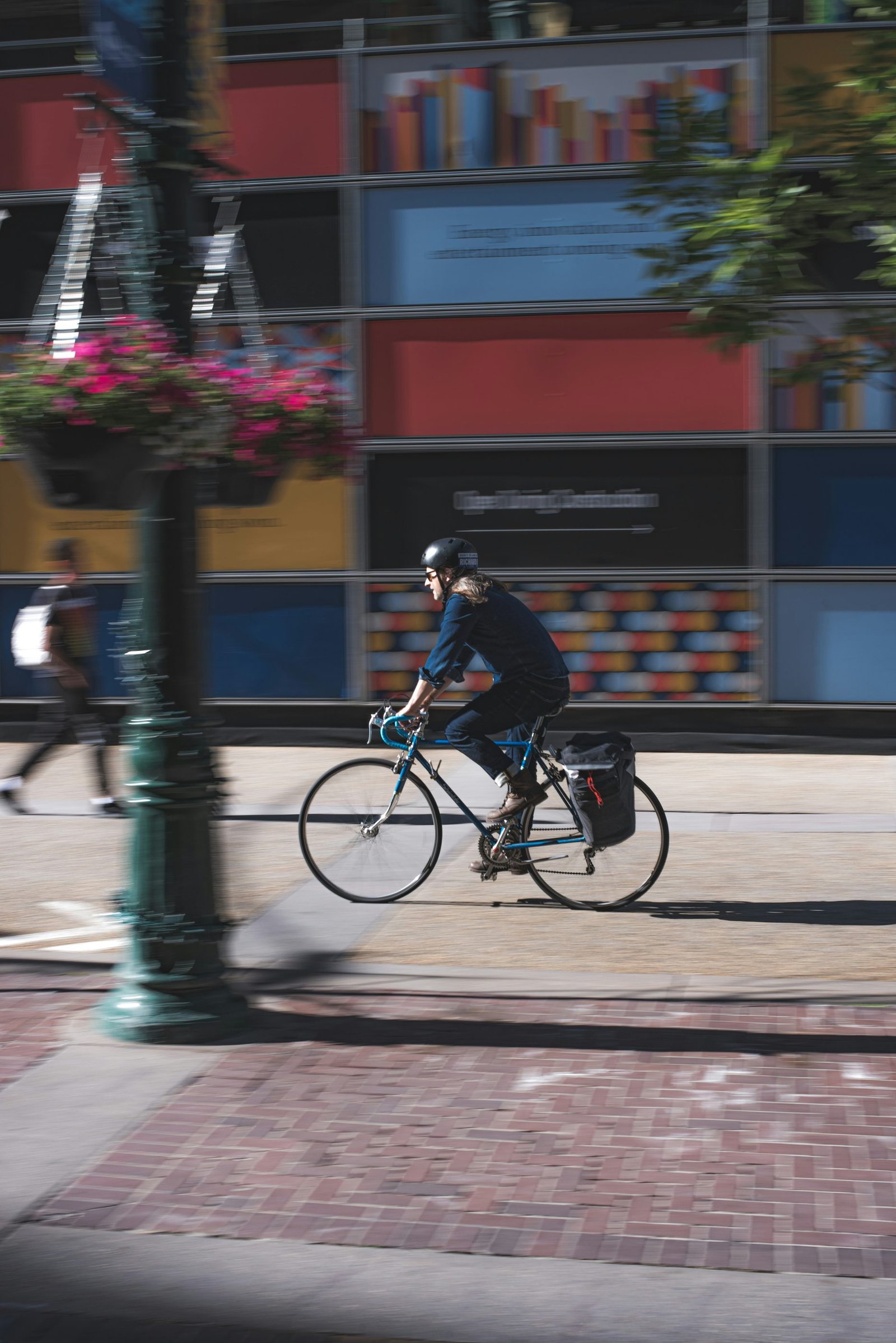 Cyclist riding a bicycle on a quiet road